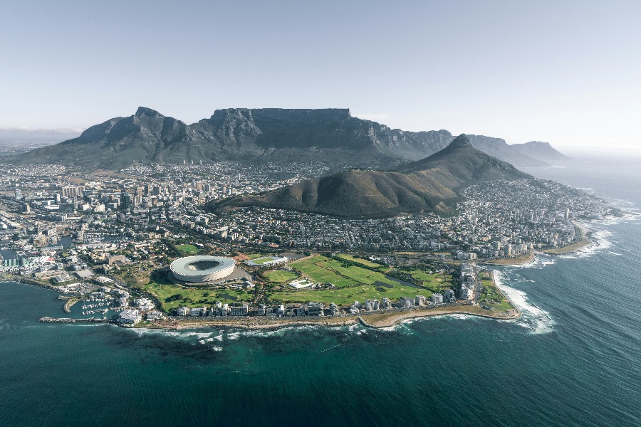 Ultra long range private jet at Cape Town International Airport, Table Mountain on the horizon, IBC Aviation